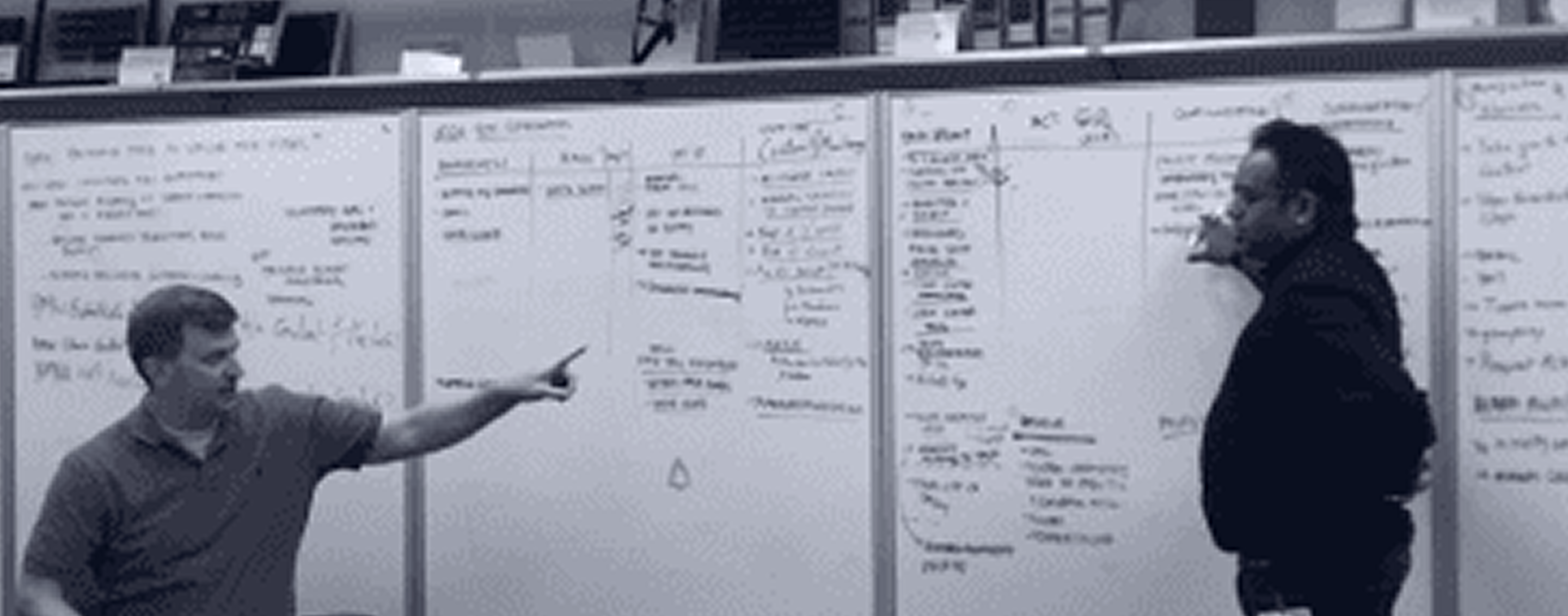 Workshop session at a whiteboard